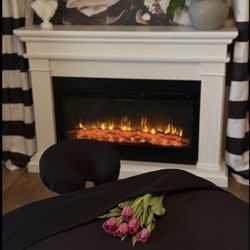 Napa Valley Massage & Wellness Spa - Custom-decorated massage suite at Napa Valley Massage & Wellness - our concierge can create a special experience with the "Trail of Roses".