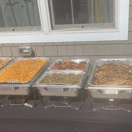 a variety of trays of food