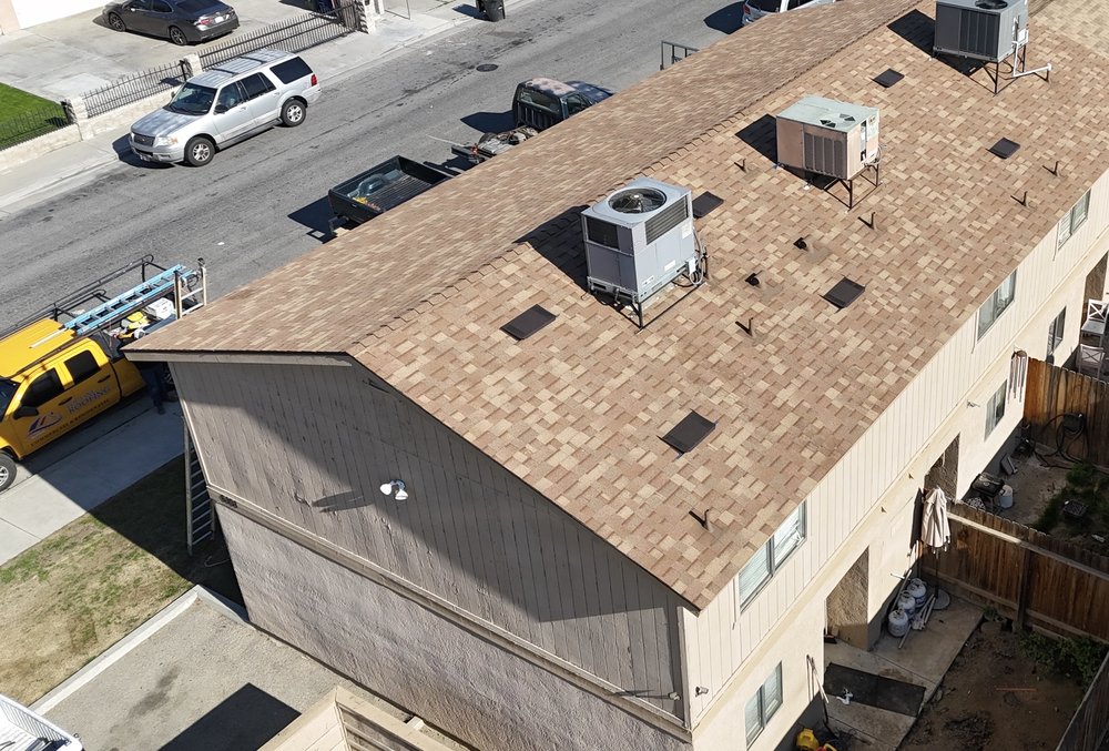 Slide of Top Line Roofing