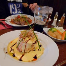 Crotty's Pub - Salmon with tasty yellow souce, fried onion and vegetables.