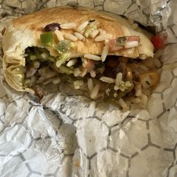 Chicken burrito. Barely any chicken and it's dry as hell.