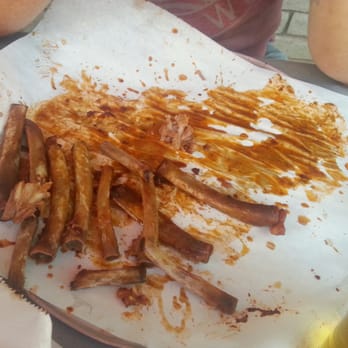 Satchmo's - See, clean bones, delicious sauce I tried to soak up with their fantastic tots. The ribs are amazing! - Cajun/Creole Near Me - Flagstaff, Arizona