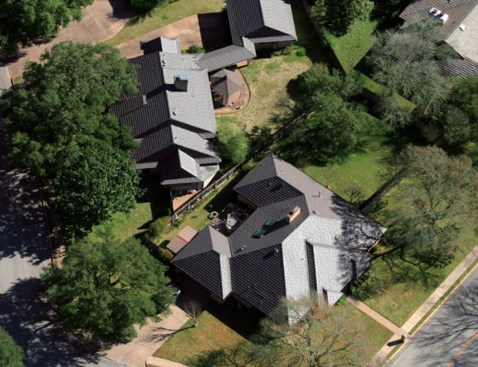 Slide of Green Knight Metal Roofing