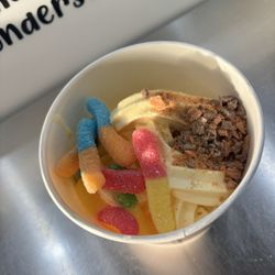 Dole , whip, frozen yogurt with sour Gummies and butterfinger