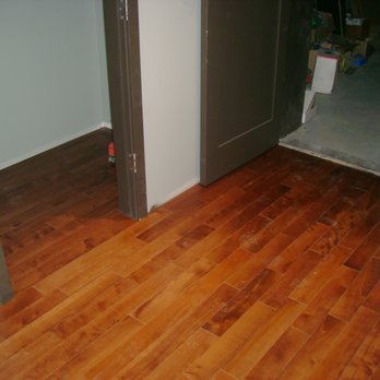 KRM Flooring - a hardwood floor in a house - Flooring Near Me