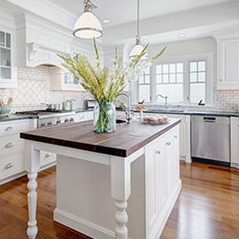 The Flooring Shop - a kitchen with a center island - Flooring Near Me - Plano, Texas The Flooring Shop - a kitchen with a center island - Flooring Near Me - Plano, Texas