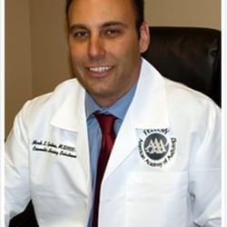 Cosmetic Hearing Solutions - Audiologist Mark Gustina