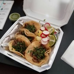 Academy Mini Market - Steak tacos witb cilanto. Radish, lettuce, lime and avocado sauce on the side