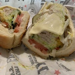 Jimmy John's - These employees made my tuna sub perfect! I asked for as many veggies as they could cram into one sub. This thing was HUGE! And delicious!