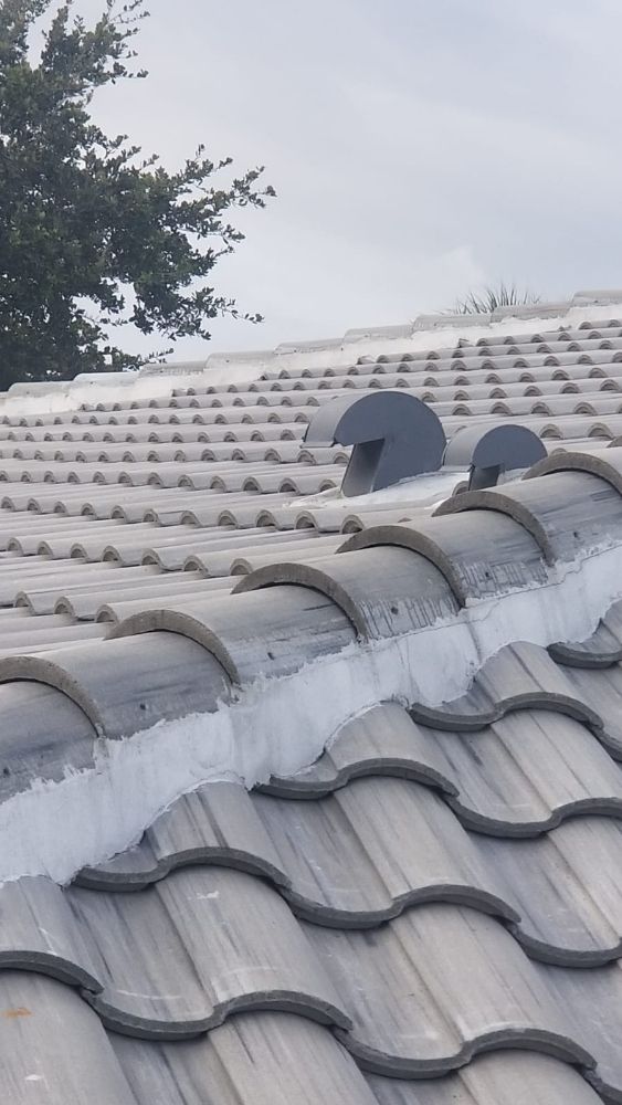 Slide of Extra Myles Roofing