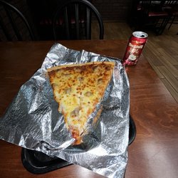 Papa Rays Pizza and Wings - Picture may not doing justice but is a huge Alice of Sausage Pizza