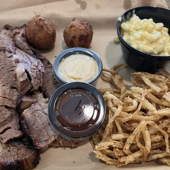 Uncle Dave’s BBQ and Bar - Brisket with mac and cheese, onion rings and jalapeño hush puppies. - American Near Me - Sandwich, Massachusetts Uncle Dave’s BBQ and Bar - Brisket with mac and cheese, onion rings and jalapeño hush puppies. - American Near Me - Sandwich, Massachusetts