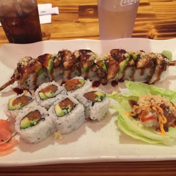 Sushi Gallery - Dragon roll, spicy tuna roll and a complimentary lettuce wrap. All very good. Big thumbs up. - Sushi Bars Near Me - Madison Heights, Michigan Sushi Gallery - Dragon roll, spicy tuna roll and a complimentary lettuce wrap. All very good. Big thumbs up. - Sushi Bars Near Me - Madison Heights, Michigan
