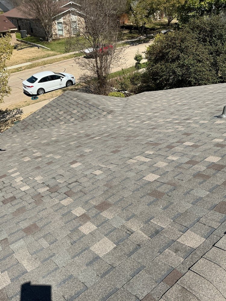 Slide of Apogee Roofing