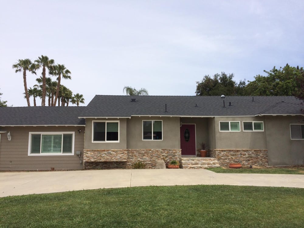 Slide of Wolfe Roofing Company