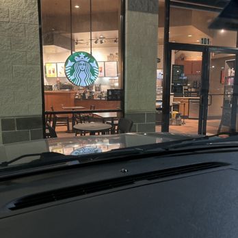 Starbucks - a view of a coffee shop through the windshield of a car - Coffee & Tea Near Me - Lewisville, Texas