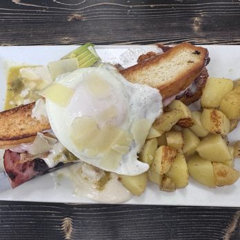 Lily and Liam Bistro - croque madame. grilled ham, melted swiss, green chile mornay sauce, and shaved swiss cheese on the perfectly cooked basted egg. potatoes. - Breakfast & Brunch Near Me - Rio Rancho, New Mexico Lily and Liam Bistro - croque madame. grilled ham, melted swiss, green chile mornay sauce, and shaved swiss cheese on the perfectly cooked basted egg. potatoes. - Breakfast & Brunch Near Me - Rio Rancho, New Mexico