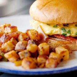 Terrace Grille Lakeland - Bacon, Egg & Cheese - On a brioche bun with truffled arugula, Gruyère, scrambled egg & garlic aioli. Available for breakfast or brunch.