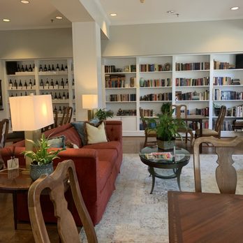 Davidson Village Inn - Lobby, breakfast area, wine selection, and library - Hotels Near Me - Davidson, North Carolina