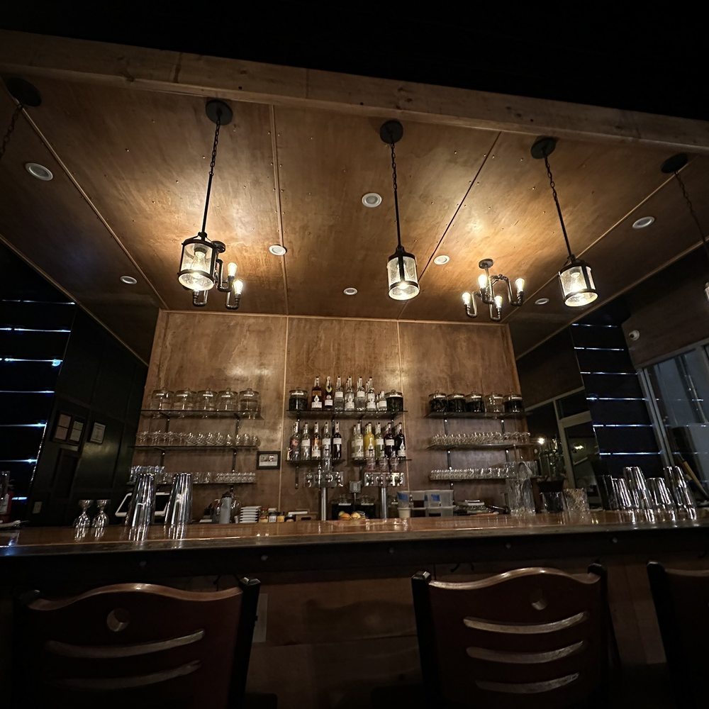 Evolve Distilling - a dimly lit bar - Distilleries Near Me - Claremont, California
