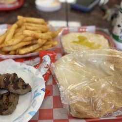 Sweetgarden Grill - Babaganush, small French fries, lamb skewer, yogurt drink (mint flavor).