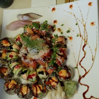Sushi Yokohama - Middle is christmas roll, left middle is godzilla roll, left right is yummy yummy roll and outer is volcano roll - Sushi Bars Near Me - Somerville, New Jersey
