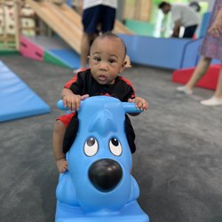 My Gym South Loop - My baby enjoying one of the many fun toys at My Gym South Loop!