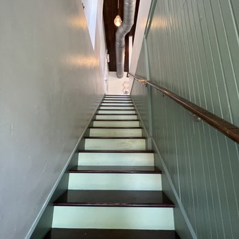 Full Bloom Coffee Roasters - Stairway upstairs, only seating is upstairs - Coffee Roasteries Near Me - Garner, North Carolina