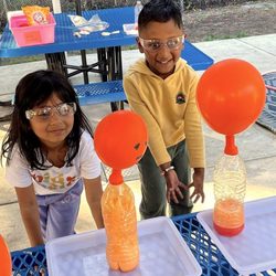Sunshine House Loma Vista - Our after-school scientists are having a blast learning about chemical reactions by making these balloons self-inflate!