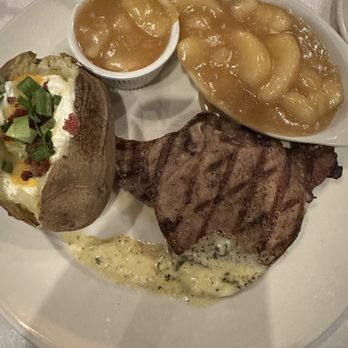 The Chop House - Petite pork chops with loaded baked potato and baked apples - Steakhouses Near Me - Augusta, Georgia The Chop House - Petite pork chops with loaded baked potato and baked apples - Steakhouses Near Me - Augusta, Georgia