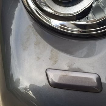 Jiffy Lube - Nice greasy hand print, on top of the oil on the armrest, console and steering wheel. - Oil Change Stations Near Me - Mt Prospect, Illinois
