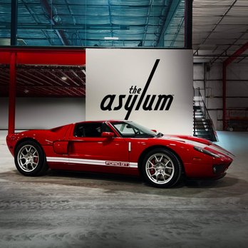 The Asylum - 2004 Red and White Ford GT at the Asylum collector car storage - Self Storage Near Me - Houston, Texas The Asylum - 2004 Red and White Ford GT at the Asylum collector car storage - Self Storage Near Me - Houston, Texas