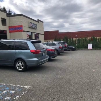 Herbal Oasis Foot Massage - Parking Lot - Massage Near Me - Kirkland, Washington
