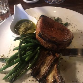 Erica Wood Fire Bistro & Raw Bar - Incredible pork chop with pesto type sauce, green beans and zucchini extra good flavor - Pizza Near Me - Pendleton, South Carolina