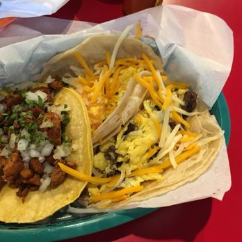 Grab N Go Tacos - Spring - Al pastor taco and two breakfast taco one with bacon the other steak fajita. Pretty good stuff - Tacos Near Me - Spring, Texas