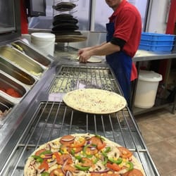 Yummie Pizza - We are happy to be serving our customers.