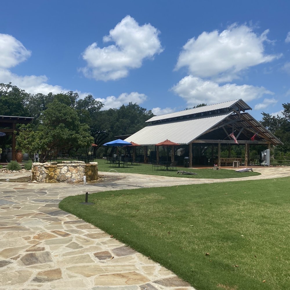 Singing Water Vineyards - One of the Outside seating areas/fountain - Wine Tasting Room Near Me - Comfort, Texas Singing Water Vineyards - One of the Outside seating areas/fountain - Wine Tasting Room Near Me - Comfort, Texas