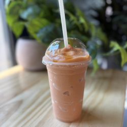 The Fruit Tree - Caribbean Dream smoothie with peaches, mango, strawberries and passion fruit inside.
