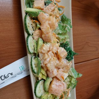 Ton Sushi - a plate of food on a table - Pan Asian Near Me - Montreal, Quebec Ton Sushi - a plate of food on a table - Pan Asian Near Me - Montreal, Quebec