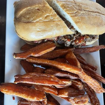 South Gate Brewing Company - Philly Cheese Steak Sandwich w/ Sweet Potato Fries - American Near Me - Oakhurst, California South Gate Brewing Company - Philly Cheese Steak Sandwich w/ Sweet Potato Fries - American Near Me - Oakhurst, California