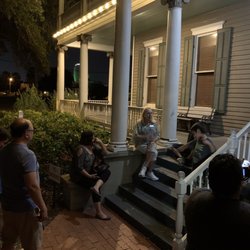 Susan giving history on one of the homes in Heritage Park.