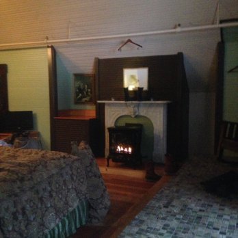 McCloud River Mercantile Hotel - You can cozy right up to the fireplace and feel right at home - Hotels Near Me - McCloud, California