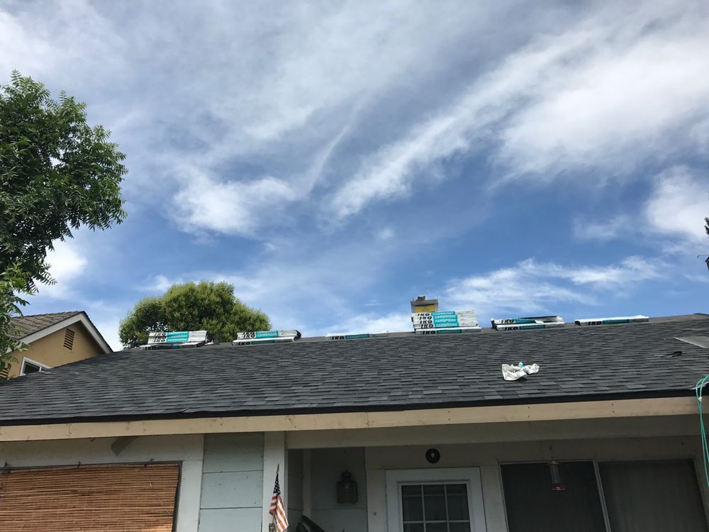 Slide of Husky Roofing