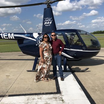 ATX Heli Tours - Our pilot and the helicopter - Aerial Tours Near Me - Pflugerville, Texas ATX Heli Tours - Our pilot and the helicopter - Aerial Tours Near Me - Pflugerville, Texas