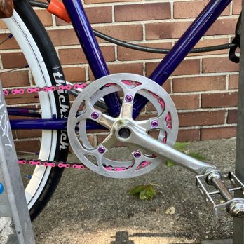 The Towne Cycles - Cool new chain ring with chain guard, pink chain, and purple details - Bike Repair/Maintenance Near Me - Oakland, California The Towne Cycles - Cool new chain ring with chain guard, pink chain, and purple details - Bike Repair/Maintenance Near Me - Oakland, California