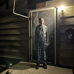 YMCA Camp Arbolado - Gentleman standing outside doorway of cabin unable to sleep due to horrible heat, smell, and noise
