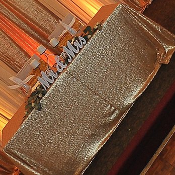 Ann's Bridal - Paid for a round table to be decorated and have a sequin table cloth. This table cloth appeared to be two pieces that were sewn together. - Bridal Near Me - Oakland, California Ann's Bridal - Paid for a round table to be decorated and have a sequin table cloth. This table cloth appeared to be two pieces that were sewn together. - Bridal Near Me - Oakland, California