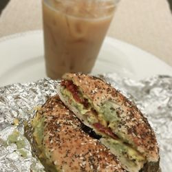 Funny Farm Coffee - Iced vanilla + hazelnut cold brew with oat milk & extra ice + everything bagel with bacon, egg, cheese and avocado