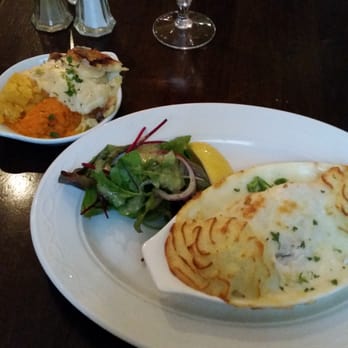 Murphy Blacks - Hake under a cheesy cream thing and "mushy vegetables"(?)- side that comes with all entrées - Irish Near Me - Kilkee, CE