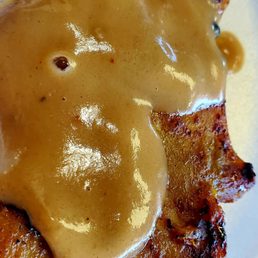 Peanut sauce on chicken satay...mild. tastes better than it looks.